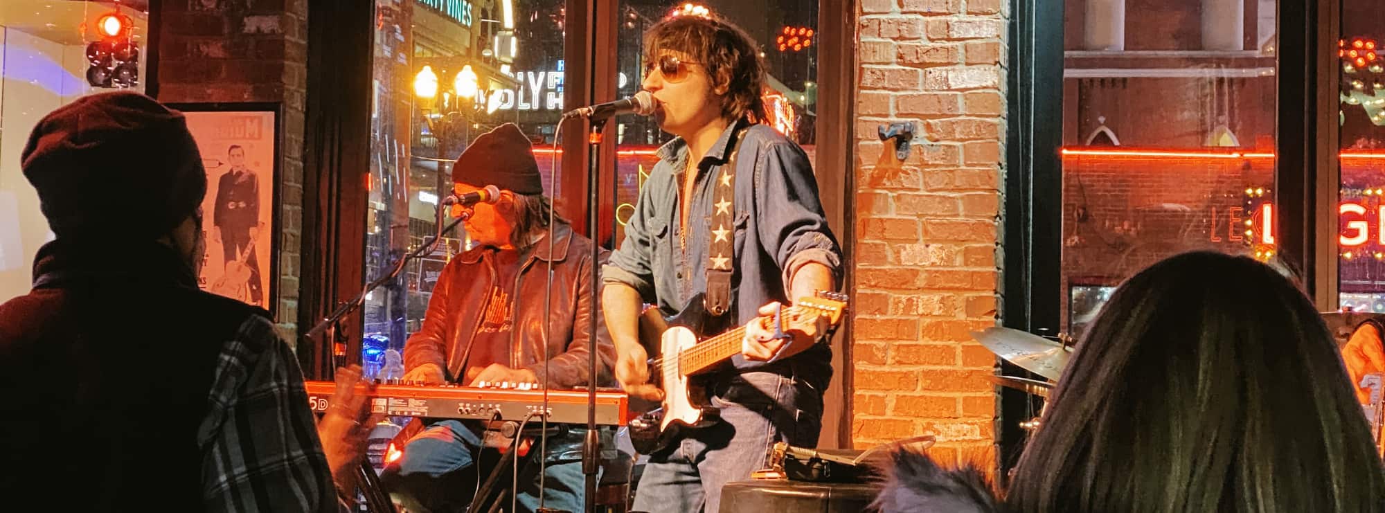 bar singer on guitar in Cleveland